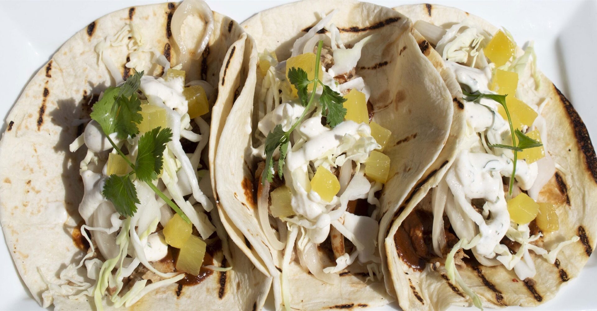 Chef’s Pork Tacos with Pickled Pineapple & Cilantro Lime Crema